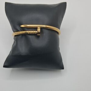 Elegant Gold Nail Bracelet